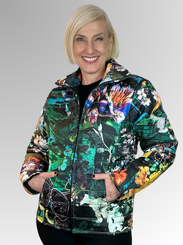 Stay warm and make a statement with this bold puffer jacket from Orientique. Made from polyester and featuring a striking floral design, this jacket is perfect for those looking to add a pop of colour to their winter wardrobe. With a high-low hemline and convenient pockets, you'll be both fashionable and warm this season.