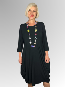 Our Bamboo Balloon Dress is made from 95% Bamboo and 5% Elastane making it super light and silky soft. Being a breathable fabric it draws moisture away from your body keeping you cool. Available in a range of beautiful colours, team it back with a colourful scarf or some great accessories to make it pop!