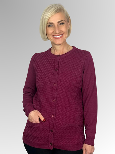 Slade Knitwear is an iconic Australian brand that has been designing and manufacturing quality women's knitwear for over 70 years. Made from 100% Pure Wool this Lattice Front Cardigan with two pockets is a true classic. Available in Currant and Navy, you can't go past Slade for winter knitwear.