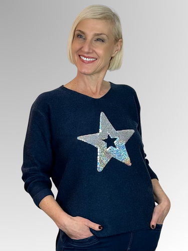 Get ready to shine in our Sequinned Star Pullover by Willow Tree! Made with a blend of cotton, polyester, and spandex, this pullover is soft, cosy, and warm, perfect for casual weekend wear. With 3/4 length sleeves, a high v-neck, and a fun sequinned star design, you'll stand out in style.