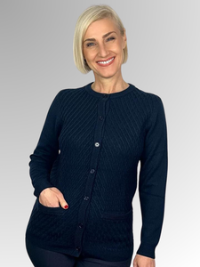 Slade Knitwear is an iconic Australian brand that has been designing and manufacturing quality women's knitwear for over 70 years. Made from 100% Pure Wool this Lattice Front Cardigan with two pockets is a true classic. Available in Navy and Currant, you can't go past Slade for winter knitwear.