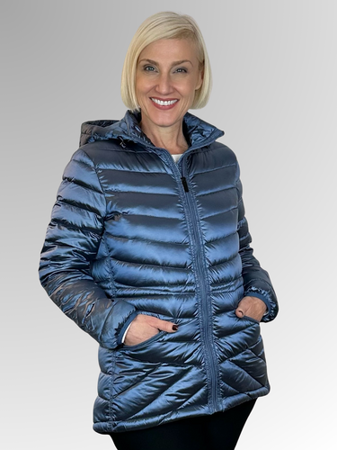 Step up your winter wardrobe with the Azure Puffer Jacket by Maglia. This must-have piece boasts a lightweight nylon shell with 90% duck down and 10% feather filling for unbeatable warmth and style. Its striking azure colour, high-low hemline and detachable hood make for a casual yet statement-making look. It even comes with a convenient packable bag for effortless travel. Upgrade your winter style with this essential jacket.