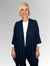 Our Bamboo Wrap is made from 95% Bamboo and 5% Elastane making it super light and silky soft. Whether you wear it as a shawl or as a scarf, this relaxed and versatile piece adds a touch of class to any outfit.