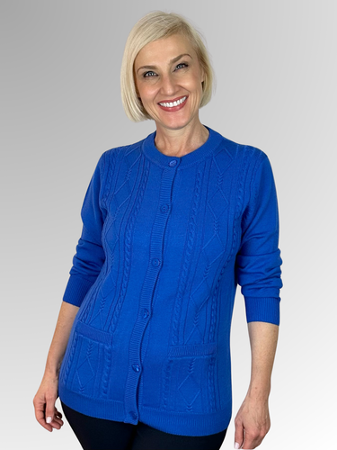 Experience the timeless elegance of Slade Knitwear, a renowned Australian brand with over 70 years of expertise in crafting premium women's knitwear. The Cobalt Diamond Front Cable Cardigan, made from a luxurious blend of Wool and Acrylic, features two pockets and is the ultimate classic piece for winter. Trust Slade for all your knitwear needs.