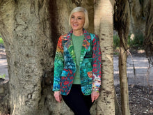 Elevate your everyday looks with the striking and vibrant Patchwork Print Blazer by Orientique. Made from 100% Cotton, this timeless piece adds a pop of colour and texture to any outfit, making it a must-have for your wardrobe.