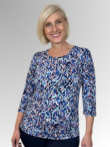 Our Nadja 3/4 Sleeve Classic Top is made from a luxurious slinky jersey. Featuring a brushstroke design in blue, coral and navy tones, this stylish print looks great on its own or team it with a jacket in a co-ordinating colour to make it pop! Made in Australia from Polyester Spandex it washes and drip-dries with no ironing required.