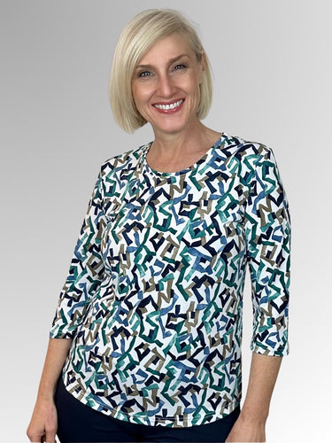 Our Connect 3/4 Sleeve Classic Top is made from a luxurious slinky jersey. Featuring an abstract design in turquoise, green, navy and white tones, this stylish print looks great on its own or team it with a jacket in a co-ordinating colour to make it pop! Made in Australia from Polyester Spandex it washes and drip-dries with no ironing required.