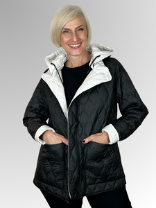 Stay on trend with the Maglia reversible puffer jacket - lightweight, stylish, and versatile! This striking two-tone jacket doubles as two jackets in one, with a detachable hood and convenient pockets. Perfect for any time of day, it's both sporty and chic. Effortlessly switch up your look with its reversible design. From the streets to the mountains, conquer any adventure in style with this nylon jacket.