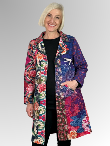 Add a splash of colour and stand out in the crowd with Orientique's Heron Multi Print Coat. Made from 100% Cotton, this coat is not only timeless, but also a statement piece that will elevate any outfit. Perfect for those looking to add some fun and colour to their wardrobe!