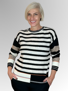 Get ready for some fun with our See Saw Stripe Pullover! Classic with a twist, this cosy sweater features highlight trims that will add a touch of playfulness to your wardrobe. Made from a combo of acrylic, wool, polyester and nylon, stay stylish and comfortable all day long.
