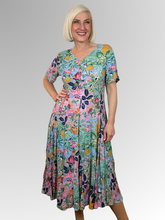 Bring vibrant charm to your everyday wardrobe with the Sur Mer Godet Dress by Orientique. Woven from lightweight sustainable rayon, this dress features a beautifully fluid drape that provides ultimate breathability and comfort for warm-weather days.