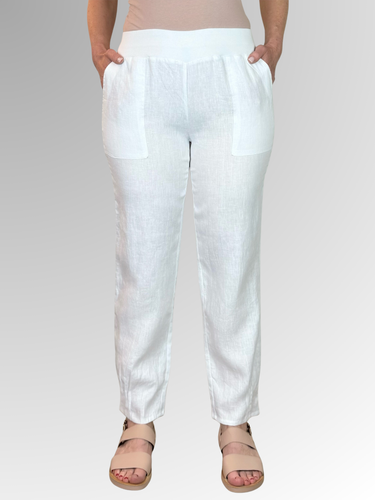 The Catalina Linen Pant by Maglia is the ultimate choice for summer style. With its cool and comfortable fit, ribbed elastic waistband, and tapered tuck detail at the ankle, these pants are both trendy and practical. Perfect for any summer outing, and with the added bonus of pockets, you can't go wrong with this relaxed fit pant.