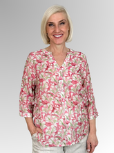 Refresh your seasonal wardrobe with the effortless charm of our Petal 3/4 Sleeve Blouse. Showcasing a beautiful, botanical-inspired print with delicate leaf and petal motifs in warm rose pink and soft sage green, this blouse brings a fresh, feminine feel to any outfit. Crafted from a premium rayon and nylon blend, it offers a luxurious, silky-soft drape and exceptional breathability, balanced with wrinkle-resistant durability for easy wear.
