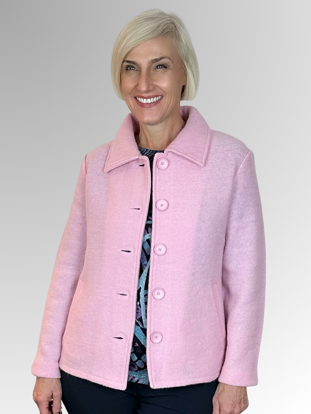 Expertly crafted, this Boiled Wool Collared Jacket is perfect for any occasion. Its modern design and semi-fitted style provide both comfort and versatility, while the Woolmark symbol guarantees the highest quality. With pockets for convenience, this jacket is warm and cosy for both day and night wear.