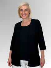Effortless style meets everyday comfort with our Black Two Piece Textured Set. Designed to take the guesswork out of styling, this chic coordinates package features a classic inner camisole paired with a perfectly matched, relaxed edge-to-edge jacket. Crafted from a premium polyester elastane blend, the fabric offers a lightweight feel with just the right amount of comfortable stretch.