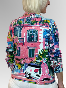 Show your unique style with this comfortable and easy-to-wear jacket. Orientique is known for vibrant colours and thoughtfully designed pieces that stay modern and on trend. The Scooter Long Sleeve Jacket, crafted from a Cotton and Spandex blend, features a colourful European streetscape print, making it a versatile and stylish addition to your wardrobe.