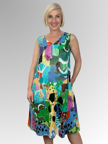 Cool and comfortable, the Alanya Blue Sleeveless Shift Dress is your stylish solution for breezy summer days. Crafted from organic cotton, it features a relaxed A-line fit and subtle V detail on the neckline, plus two handy side seam pockets. The colour palette is inspired by pop art - because fashion should be fun!