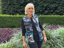 Say hello to the Porto Blue Zip Vest from Orientique. Crafted from cotton, this vest is both sporty and stylish, featuring an eye-catching global architectural print inspired by colourful streetscapes that evoke the spirit of exploration and discovery. Complete with a functional zipper and practical pockets, it's the perfect layering piece to mix and match with your everyday wardrobe. Whether you're dressing up a casual outfit or adding texture to your look, this versatile vest brings a pop of colour and tr