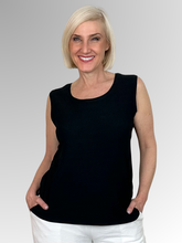 Effortless style meets everyday comfort with our Black Two Piece Textured Set. Designed to take the guesswork out of styling, this chic coordinates package features a classic inner camisole paired with a perfectly matched, relaxed edge-to-edge jacket. Crafted from a premium polyester elastane blend, the fabric offers a lightweight feel with just the right amount of comfortable stretch.