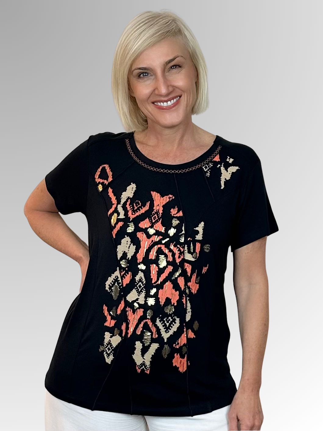 The Christina Top by Bagoraz is a playful blend of comfort and style. Made in Portugal from soft viscose elastane, it features a dark navy base with an eye-catching abstract foil print down the front. Unique criss cross contrast stitching accents the neckline, while stitch detail panels add a fashionable twist. This top brings a fresh, stylish flair to your wardrobe with its standout details and comfy fit.