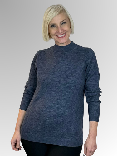 Stay stylish and comfortable in our Denim Chain Knit Pullover by Maglia. Made with a blend of viscose, polyester, nylon, and wool, this pullover is soft and cosy, perfect for weekend wear or casual outings. The low relaxed turtle neck adds a classic touch to any outfit. Upgrade your wardrobe with this must-have piece!