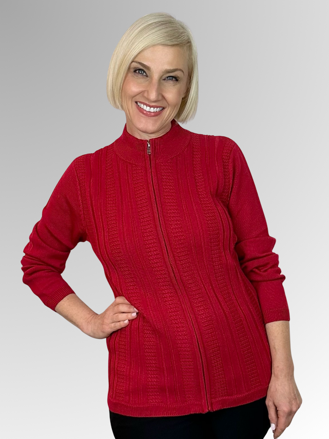 Slade Knitwear is a well-known Australian brand with a 70-year history of creating high-quality knitwear for women. This Cherry Zip Front Cardigan, made from 100% Wool, is a sporty and versatile addition to any outfit. Slade is the go-to for all your winter knitwear needs!