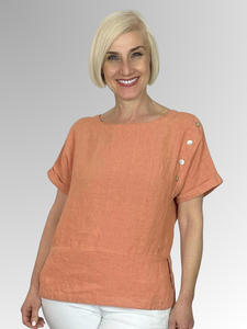 The perfect addition to your summer wardrobe! Maglia's Sophia Linen Top in Ochre offers fashionable linen in a relaxed fit. Cool for hot days, the top also features button detail on one shoulder for added style.