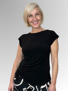 The Black Tuck Top by Philosophy offers a stylish and classic look that effortlessly takes you from day to night. Its tuck detail with soft gathering creates a flattering, feminine silhouette, enhancing your natural shape. Crafted from a polyester-elastane blend, it ensures comfort, flexibility, and easy care, making it a versatile and elegant addition to your wardrobe.