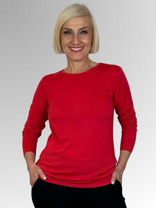 Indulge in luxury with our Maglia Extra Fine Merino Long Sleeve Top in Red. Crafted from 100% Australian Merino Wool, this essential winter piece offers unparalleled softness and comfort. Perfect for layering and easily washable, it's the perfect addition to any sophisticated wardrobe.