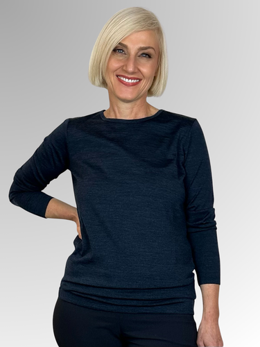 Indulge in luxury with our Maglia Extra Fine Merino Long Sleeve Top in Navy. Crafted from 100% Australian Merino Wool, this essential winter piece offers unparalleled softness and comfort. Perfect for layering and easily washable, it's the perfect addition to any sophisticated wardrobe.