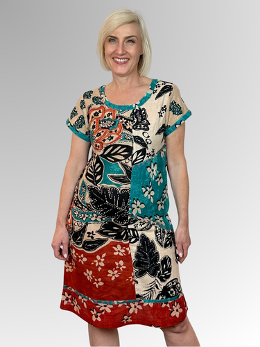 Elevate your warm-weather wardrobe with the Saventa Patch Dress by Orientique; a breezy essential crafted from Certified Organic Cotton. Featuring an eye-catching botanical print and distinctive neckline stitching, this lightweight piece keeps you cool while turning heads. Perfect for lazy days in the sun or casual outings, it's the effortless style upgrade your summer deserves!