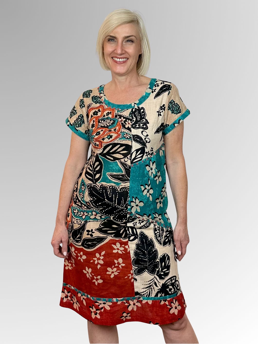 Elevate your warm-weather wardrobe with the Saventa Patch Dress by Orientique; a breezy essential crafted from Certified Organic Cotton. Featuring an eye-catching botanical print and distinctive neckline stitching, this lightweight piece keeps you cool while turning heads. Perfect for lazy days in the sun or casual outings, it's the effortless style upgrade your summer deserves!