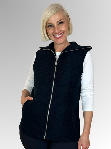 Our Navy Zip Front Vest is expertly crafted from boiled wool and showcases the 