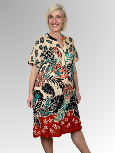 Step into summer with the vibrant charm of our Saventa Keyhole Shift Dress. Featuring a playful mix of prints and bold colours, this standout piece is perfect for sunny days and warm-weather adventures. Designed with a relaxed fit, short sleeves, and a flattering V-neckline, it's crafted from breathable rayon to keep you cool and effortlessly stylish all season long.