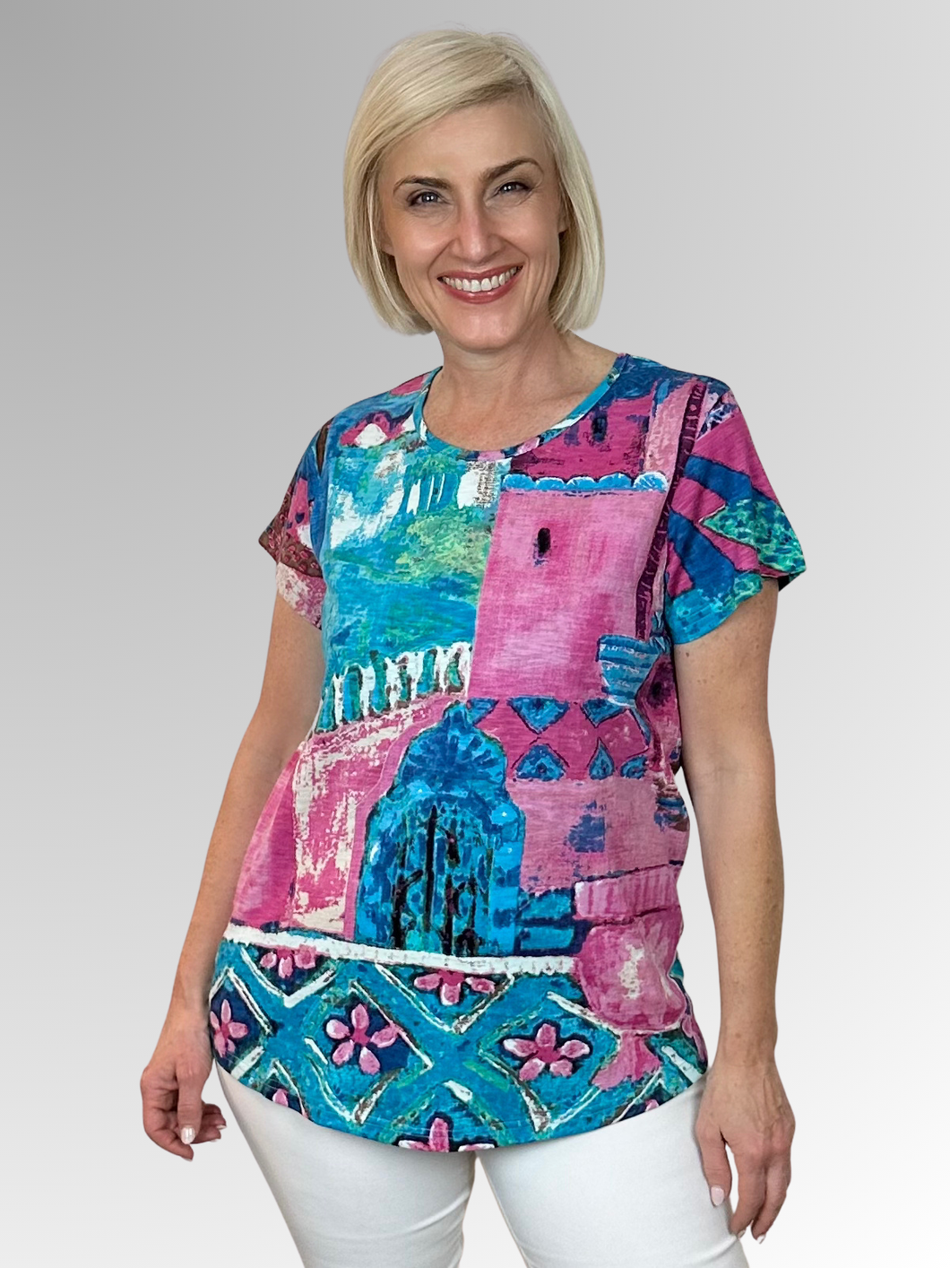 Swing into summer in this relaxed, easy to wear tee! When it comes to Orientique, expect amazing colours and comfortable designs that look modern and on trend. Crafted by Orientique's artists, the Marakesh Round Neck Tee is made from Certified Organic Cotton and features a design inspired by scenery and motifs from around the world. Designed to fall easily over the tummy and hips, it's shaped with an A-line for a more roomy fit.