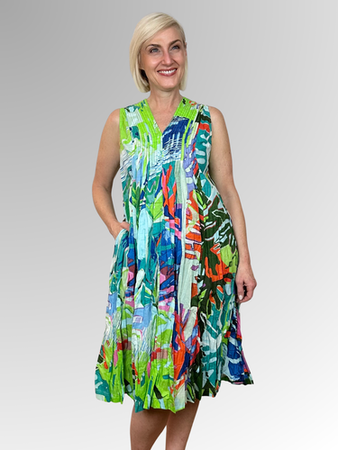 Slip into summer style with the Leaves Sleeveless Pleat Dress by Orientique. This breathable crinkled organic cotton piece features a captivating print and flattering V-neckline with subtle pleating at the bust. Convenient pockets add everyday practicality to this lightweight essential. Comfortable, stylish, and wonderfully relaxed, it's the dress you'll reach for whenever warm weather calls.
