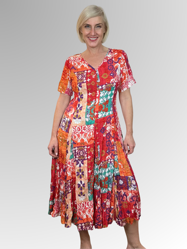 Introducing the Araya Godet Dress by Orientique! Made from soft, sustainable rayon, this dress features hand painted Persian and Oriental motifs in a gorgeous mix of jade, watermelon and peach tones. The crinkle fabric is oh-so-comfy with no ironing required. Featuring short sleeves, a flattering V-neckline and godet panels through the skirt that create a beautiful drape and swing. Perfect for summer, this cool and flowy dress is a must-have addition to your wardrobe.