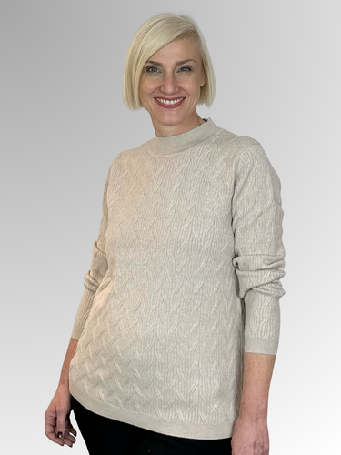 Stay stylish and comfortable in our Oatmeal Chain Knit Pullover by Maglia. Made with a blend of viscose, polyester, nylon, and wool, this pullover is soft and cosy, perfect for weekend wear or casual outings. The low relaxed turtle neck adds a classic touch to any outfit. Upgrade your wardrobe with this must-have piece!