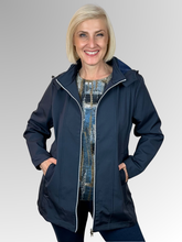 The Apex Jacket in navy is your go-to layer for unpredictable weather. Crafted from durable polyester, it features a detachable hood for flexible coverage, a zip front for easy on-and-off, and practical pockets to keep essentials close. Lined with soft fleece for added warmth, it's designed to keep you warm and dry. An adjustable drawstring band cinches at the waist for a custom fit. Whether you're running errands or heading out for the day, this everyday jacket delivers reliable protection and style.