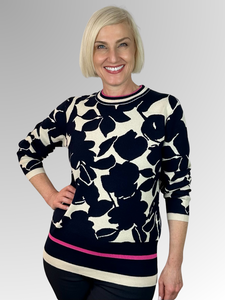 Wrap yourself in luxury with our Wear Colour Shadow Floral Pullover. This stylish and fashionable piece is both soft and eye-catching, with a mix of navy and natural tones highlighted by hot pink accents. Made from a blend of viscose and nylon, it's the perfect choice for a fun and playful look this autumn/winter.