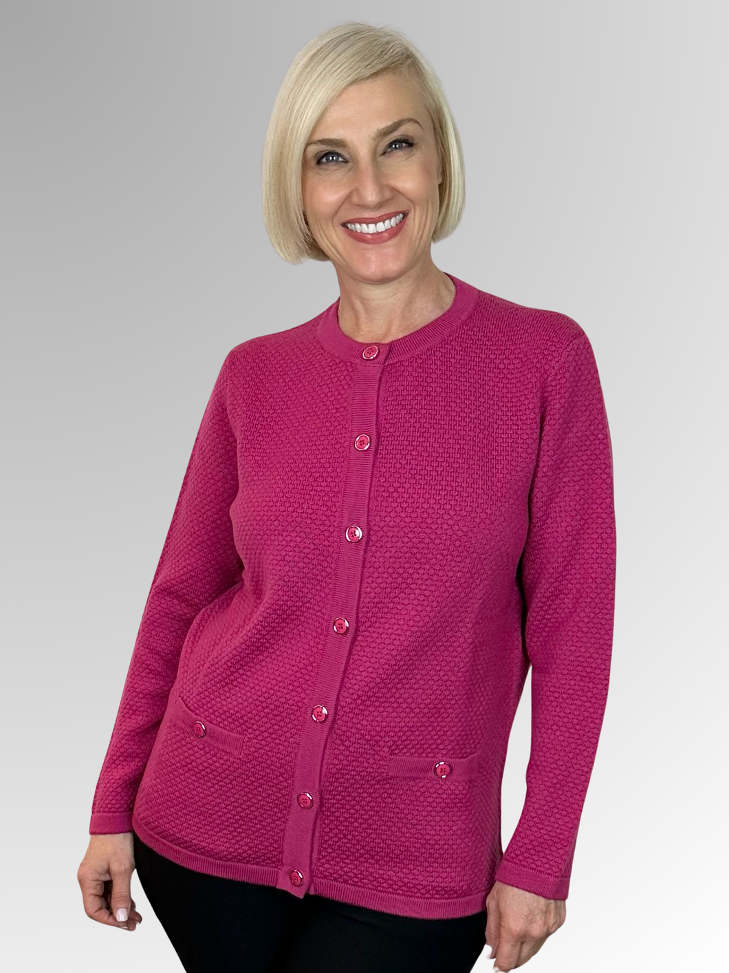 With over 70 years of experience in designing and crafting high-quality women's knitwear, Slade Knitwear is a renowned Australian brand. Made from 100% Pure Wool, their Magenta Bubble Stitch Cardigan, complete with two pockets, is a timeless and luxurious addition to any winter wardrobe. Trust in Slade for the best in winter fashion.