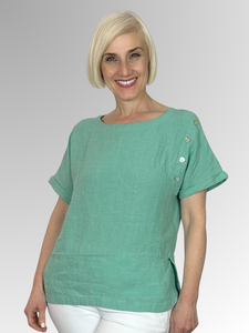 The perfect addition to your summer wardrobe! Maglia's Sophia Linen Top in Mint offers fashionable linen in a relaxed fit. Cool for hot days, the top also features button detail on one shoulder for added style.