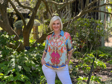 The Lula Soul Le Sereno Shirt in Ocean offers a refined summer statement with its elegant placement print in deep, summery hues. Crafted from smooth, silky viscose, this top delivers exceptional comfort and a luxurious feel. It’s an excellent addition to your warm-weather collection, blending sophistication with a touch of playful charm.