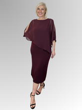 Make a statement with our Chiffon Overlay Dress in Port. Designed for those who love timeless elegance, this piece is all about confidence and effortless style. Made in Australia from polyester/elastane, it drapes beautifully creating a flattering silhouette that enhances your natural shape. Add your favorite accessories and you're ready to own the moment.