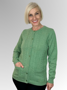 For over 70 years, Slade Knitwear has been an iconic Australian brand known for its high-quality women's knitwear. This classic Pistachio Cable Front Cardigan, made from 100% Pure New Wool and featuring two pockets, is a must-have for winter. Trust Slade for all your knitwear needs.