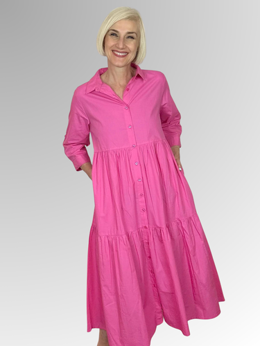 A timeless shirtdress from Orientique's Summer Essential collection crafted with 100% Organic Cotton Poplin. With a classic rose pink hue, this piece features a button-through front, collar, and 3/4 length sleeves with fold-back tabs, for a chic, comfortable look that will stay on-trend all season long. Elevate with colourful beading for a unique finish.
