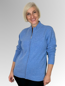 Introducing the Lambswool Wedgewood Zip Cardigan by Bromley, the perfect addition to any winter wardrobe. Made from 100% lambswool, this versatile piece offers both warmth and style with its stand-up neckline. Wear it zipped up as a top or open with a layer underneath for a comfortable and fashionable look. Trust in the quality of Bromley to keep you cosy all season long.
