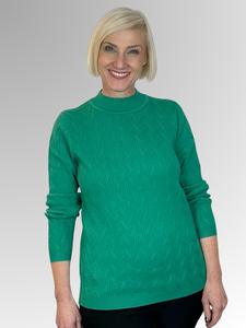 Stay stylish and comfortable in our Jade Chain Knit Pullover by Maglia. Made with a blend of viscose, polyester, nylon, and wool, this pullover is soft and cosy, perfect for weekend wear or casual outings. The low relaxed turtle neck adds a classic touch to any outfit. Upgrade your wardrobe with this must-have piece!