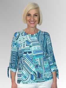 Indulge in sophisticated style with the Corsican Aquamarine Tie Sleeve Top. Made in Australia from polyester and spandex, this easy-care print top is perfect for any occasion. Its stylish design combines function and fashion for a timeless, tasteful look that will never go out of style.