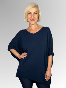 Our Bamboo Easy Top is made from 95% Bamboo and 5% Elastane making it super light and silky soft. Being a breathable fabric, it draws moisture away from your body keeping you cool and fresh. Generously shaped and great for covering those curves, it's the ideal go to for any time of day. Available in a range of beautiful colours, team it with some great accessories to make it pop!